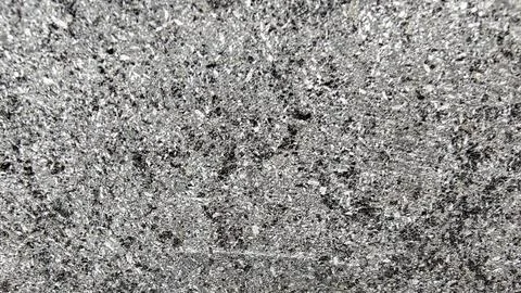 Close Up Texture of Grey Granite Stone Surface with Grainy Mineral Pattern Fotos de archivo