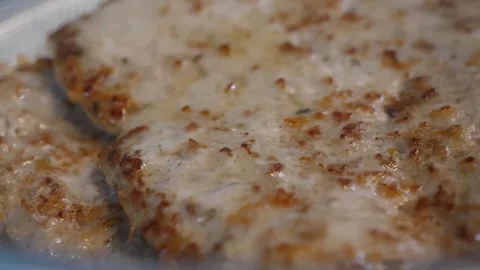 Close-up texture of hot Italian cheese pizza with golden brown crust. Video stock 337676604