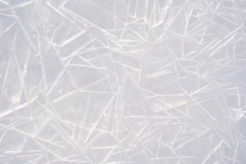 Close-up texture of the ice surface on the frozen sea with beautiful patterns of Stock Photos