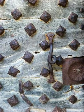 Close Up Texture of Iron Studs on Door at Fort Royal Ile Sainte-Marguerite Stock Photos