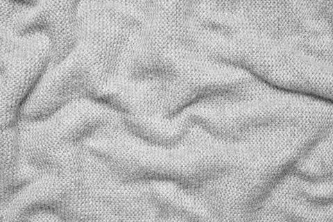 Close up texture of light gray crumpled woven fabric with a subtle pattern of Foto stock