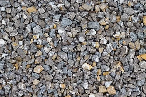 Close-up of the texture of multi-colored granite rubble. Stock Photos