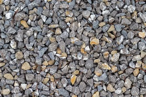 Close-up of the texture of multi-colored granite rubble. Stock Photos