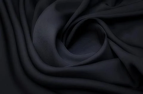 Close-up texture of natural gray or black fabric or cloth in same color. Fabr Stock Photos