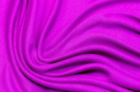 Close-up texture of natural red or pink or fuchsia fabric or cloth in same co Foto stock
