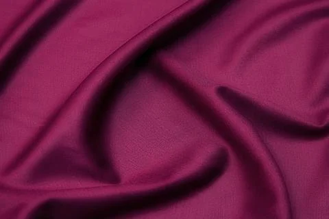 Close-up texture of natural red or pink fabric or cloth in same color. Fabric Stock Photos