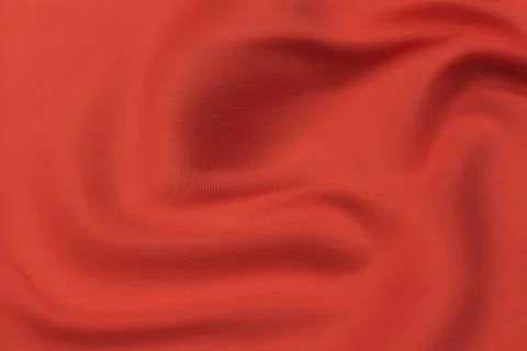 Close-up texture of natural red or pink fabric or cloth in same color. Fabric Stock Photos