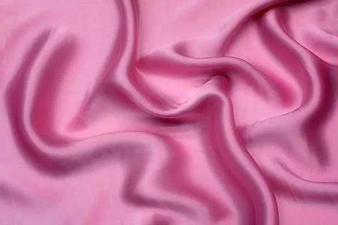 Close-up texture of natural red or pink fabric or cloth in same color. Fabr.. Stock Photos