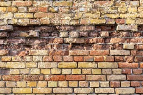 Close-up texture of the old red brick wall. Abstract close-up brick wall back Stock Photos