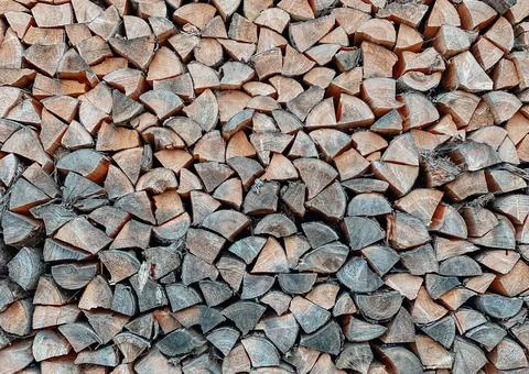 Close-up texture of pine logs prepared and folded neatly Stock Photos