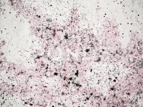 A close-up of a texture of a polished rose granite rock surface Stock Photos