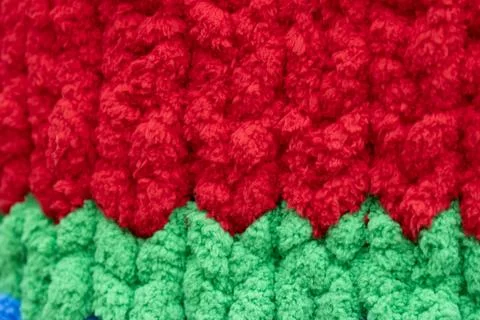 Close-up Texture of Red and Green Crocheted Yarn Stock Photos