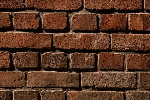 Close-up texture of red brick wall. Abstract background pattern Stock Photos