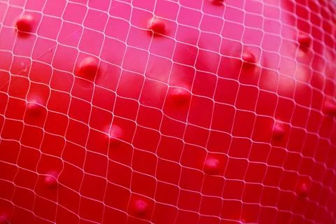 Close-up texture of red geometric surface Foto stock