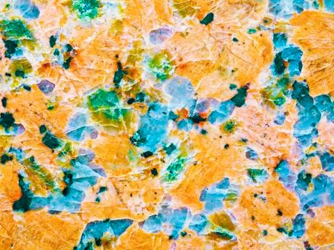 A close-up of a texture of red polished granite surface Stock Photos