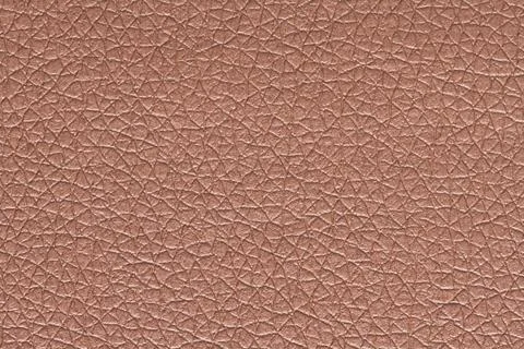 Close-up texture of rose gold metallic pebbled leather grain Stock Photos