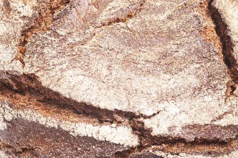 Close-up texture of rye bread crust 스톡 사진