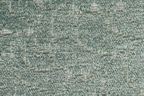 Close-up texture of sage green patterned woven fabric or carpet Stock Photos