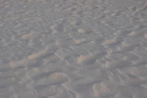 Close Up Texture of Sandy Beach 库存照片