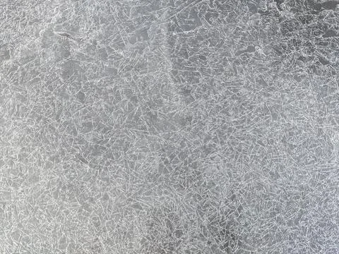 Close Up Texture of Shattered Ice Crystals on Frozen Water Foto stock