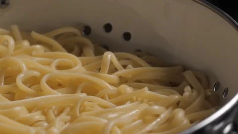Close up texture shot of cooked spaghetti noodles plain. Stock Footage 124015669