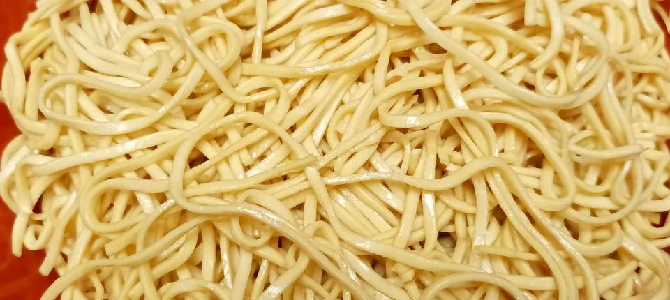 A close-up texture shot of plain cooked spaghetti noodle Stock Photos