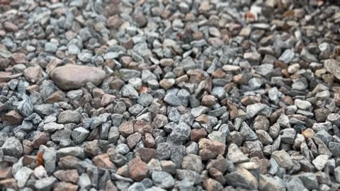 Close-up texture of small rocks, showing irregular stones Stock Footage 311503813
