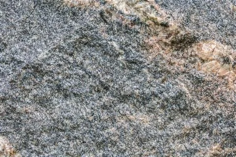 Close-up texture of speckled granite with pink and gray mineral inclusions Stock Photos