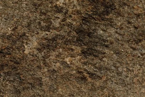 Close-up of the texture of the stone by the lake. Stock Photos