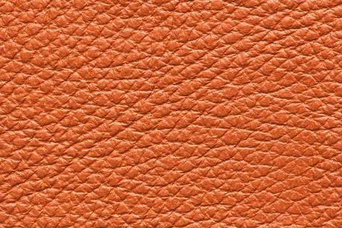 Close-up texture of warm brown pebbled leather grain Stock Photos