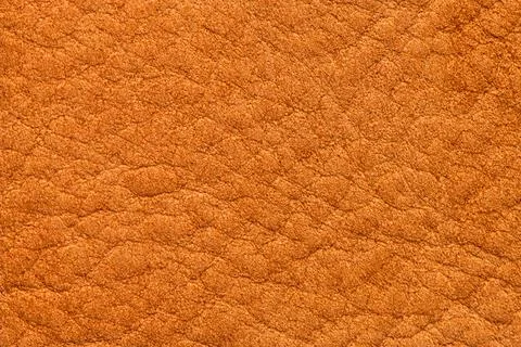 Close-up texture of warm brown suede leather grain Stock Photos