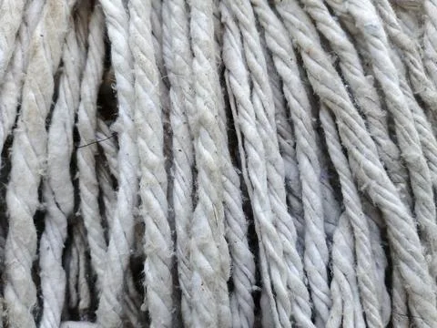 Close-up Texture of White Cotton Mop Strands Stock Photos