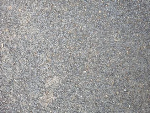 Close-up of Textured Asphalt Road Surface Stock Photos