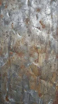 Close up textured background of weathered and rusty distressed metal surface Illustrazione stock