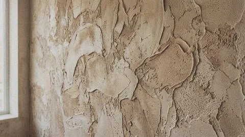 Close-up of textured beige wall. Фото