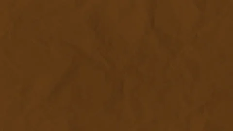 Close-up of textured brown paper surface. 스톡 동영상 340756151