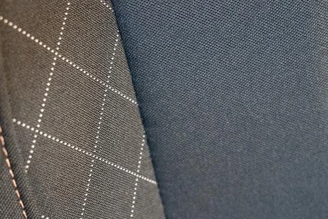 Close-up of textured fabrics displaying various patterns and colors, suitable Stockfoto's