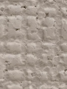 Close-up textured foam insulation surface in neutral beige Stock Photos