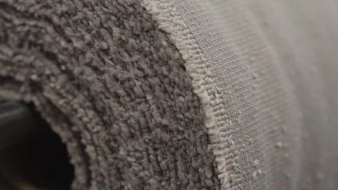 Close-Up of Textured Gray Fabric Roll Stock Footage 317735898