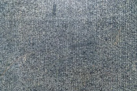 Close-up of textured gray stone surface with subtle patterns 스톡 사진