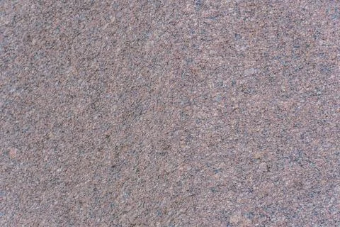 Close-up of textured, irregular brown-red particles in a mosaic pattern No .. Photos