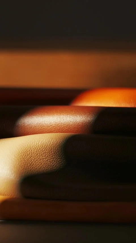 Close up of textured leather rolls with moving light Stock Footage 331775244