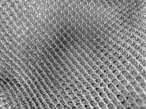 Close-up of textured metal surface with bumpy pattern 写真素材
