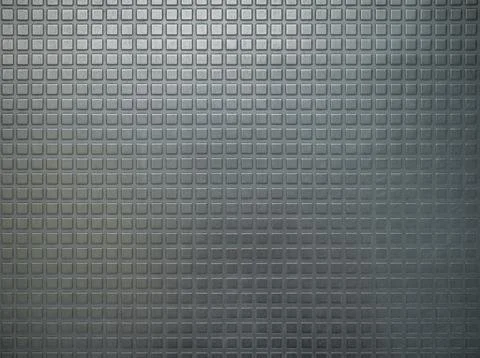 Close-up of textured metallic surface with square pattern Stock Photos