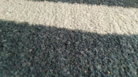 Close-up of a textured surface (carpet) with a distinct white stripe Stock Footage 325652130