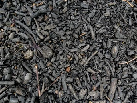 Close-up of a Textured Surface Composed of Irregular Dark Burnt Wood and Ch.. Stock Photos