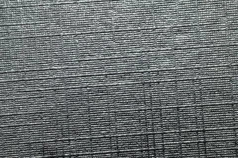 Close-up textured surface with horizontal and vertical embossed lines Stock Photos