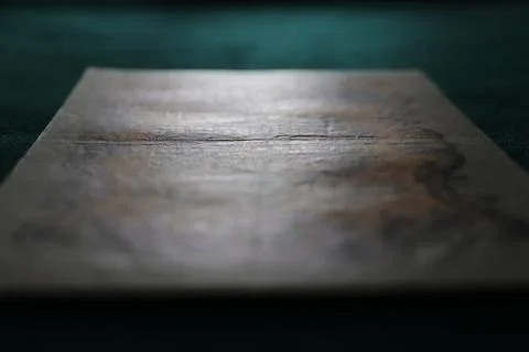 A close-up of a textured surface with subtle patterns and reflections, crea.. 스톡 사진