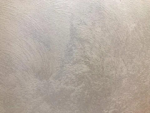 Close-up of a textured wall or panel with rough and irregular surface, possib Foto stock