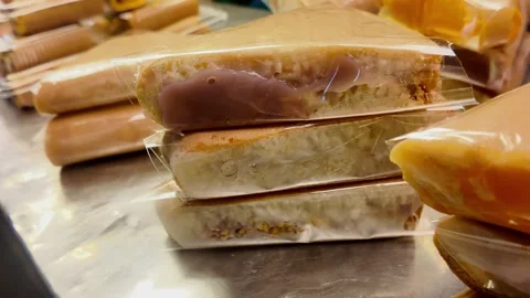 Close-Up of Thai Dessert Cross Section Wrapped in Plastic, 4K Vídeo Stock 331984186